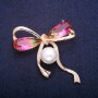 Bow Brooch with Pearl Bead and Yellow-Pink Crystals in Swarovski Style, Golden Metal 45x47mm