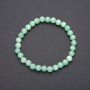 Bracelet made from natural Burmese jadeite on an elastic cord, smooth beads, diameter 6(±)mm, length 18 cm