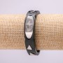 Bracelet with metal inserts, 21 cm long, 15 mm thick, black rubber, with clasp