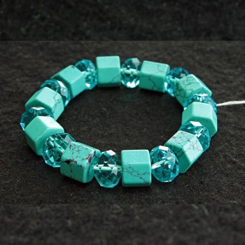Elastic bracelet with blue turquoise (synthetic) with veining and Czech glass