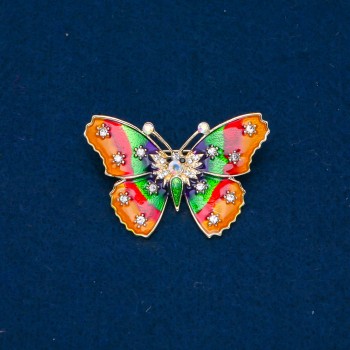 Butterfly Brooch in gold-tone metal, enamel, and white iridescent rhinestones, 30x44mm