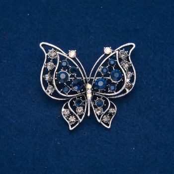 Butterfly Brooch in silvery metal with blue, gray, white, and gasoline-colored crystals, 46x52 mm +