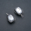 Pendant in a silver-woven hematite setting, diameter 30×22 mm+