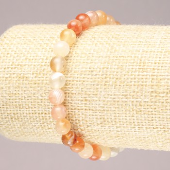 Elastic bracelet with natural orange agate, smooth bead, diameter 6.5 mm+