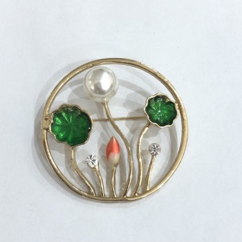 Brooch 'Plants' with enamel, white rhinestones and a bead, gold-tone metal 47mm+