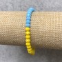 Elastic bracelet with Czech crystal 'Ukraine' faceted rondel, diameter 6×4 mm, length 18 cm