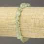 Elastic bracelet with natural prehnite, faceted beads, diameter 10×8 mm+