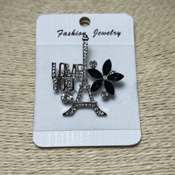 Брошка Париж сріблястий метал стрази і сині кристали 40х35мм +