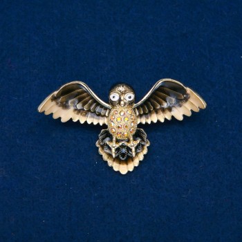 Brooch Bird with enamel and petrol-colored rhinestones, gold-toned metal 65x35mm +
