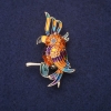 Parrot Enamel Brooch in Orange, Green, Yellow, and Purple — 50x30 mm, Gold-Tone Metal