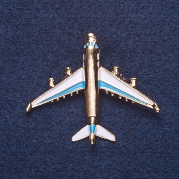 Brooch "Plane" white and blue enamel, gold-tone metal, 4x5 cm