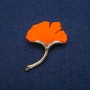 Bach Leaf orange matte enamel, gold-tone metal 33×47mm