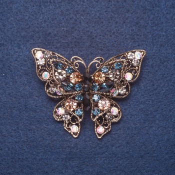 Brooch 'Butterfly' in multicolored large rhinestones, gold-tone metal, 4x5 cm