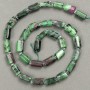 Beads on a thread of natural zoisite, faceted 11×7 mm, length 40 cm ±, with seed beads (3×2 mm)