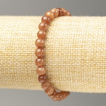 Elastic bracelet with imitation selenite (acrylic smooth beads), 6.5 mm diameter, length 18 cm