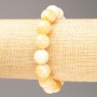 Elastic bracelet with imitation mother-of-pearl (artificial acrylic) — smooth beads, 12.5 mm diameter, 18 cm length