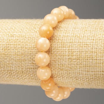 Elastic bracelet imitating selenite (acrylic) — smooth beads, 10 mm diameter, 18 cm length