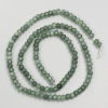 Synthetic nephrite beads, faceted rondelle on thread, 4x3 mm, length about 38 cm