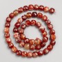 Beads of natural Sardonyx, faceted cubes on thread, diameter 7mm ±, length 38cm ±