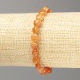 Carnelian Bracelet, natural stone, faceted, on elastic, bead diameter 7×8 mm, length 18 cm