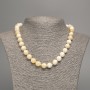 Yellow-white 'Selenite' Necklace with smooth beads, 10 mm diameter, about 50 cm long, made of white nephrite (synthetic dyed)