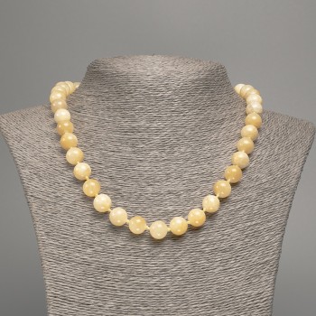 Pale-yellow 'Selenite' Necklace with smooth beads, 10 mm in diameter, approximately 50 cm long, made of white nephrite (synthetically dyed)