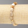 Bracelet with fossilized coral faceted beads, diameter 7x10 mm ± on elastic, length 18 cm+