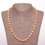 Peach-colored oval freshwater pearl necklace, 8×10 mm diameter, 50 cm long