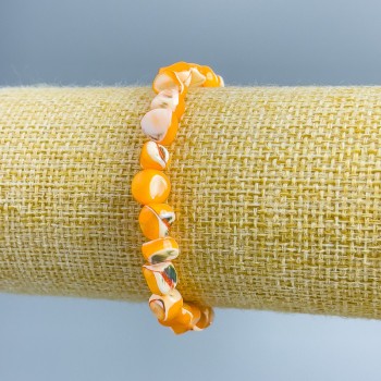 Bracelet with light-orange mother-of-pearl faceted beads, 8x6 mm diameter, length 18 cm (stretch)