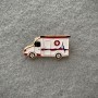 Brooch 'Ambulance' white enamel, golden metal 18×32mm+