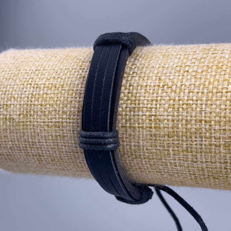 Bracelet, length 18-25 cm, thickness 12 mm, eco-leather, color black, with a drawstring closure