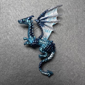 Dragon Brooch with blue enamel on silver metal, 42x66 mm