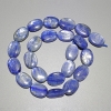 Kyanite beads, natural stone, oval, diameter 12×16 mm ±, length 40 cm ± on a thread