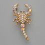 Brooch-pendant Scorpio with white crystals and chameleon crystals, gold-tone metal 28x54 mm