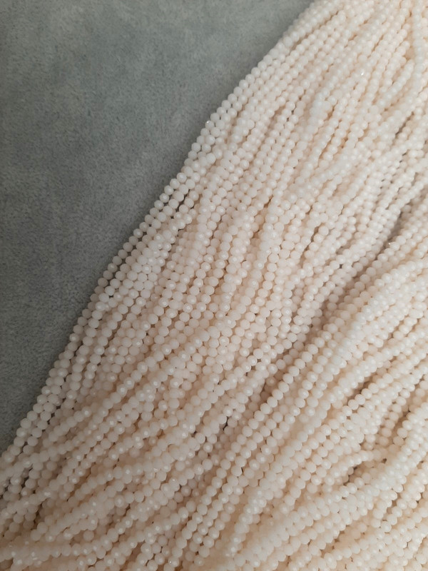 Milky Czech Crystal faceted rondelle beads, diameter 3x2.5 mm, length 40 mm, on a thread