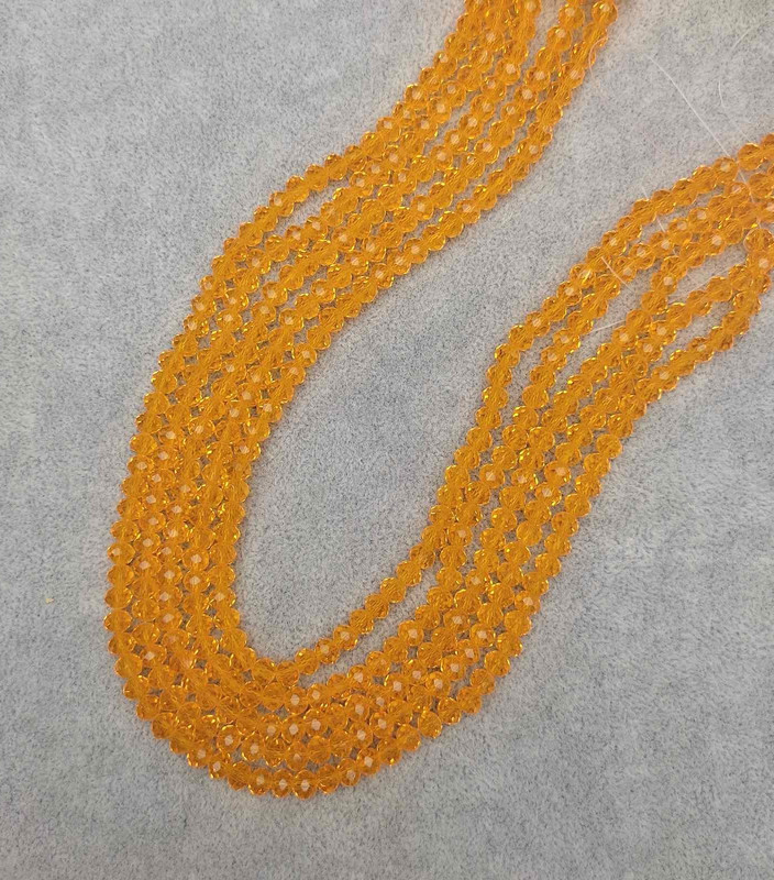 Beads Czech Crystal orange transparent faceted rondelle, diameter 6x5mm, length 41mm, on fishing line