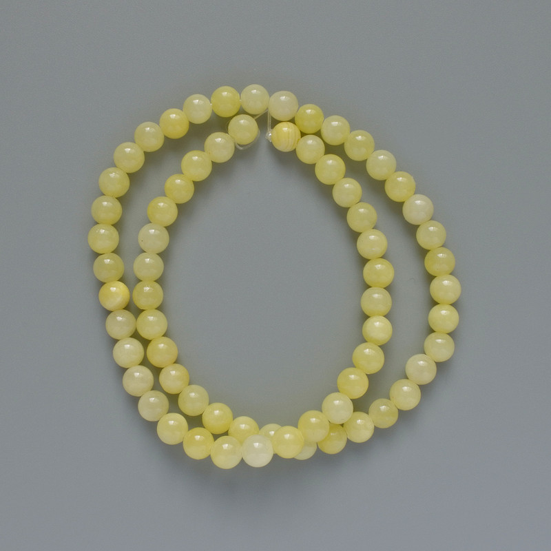 Citrine Beads (artificial acrylic) smooth round beads, diameter 6.5 mm, length about 40 cm, on monofilament