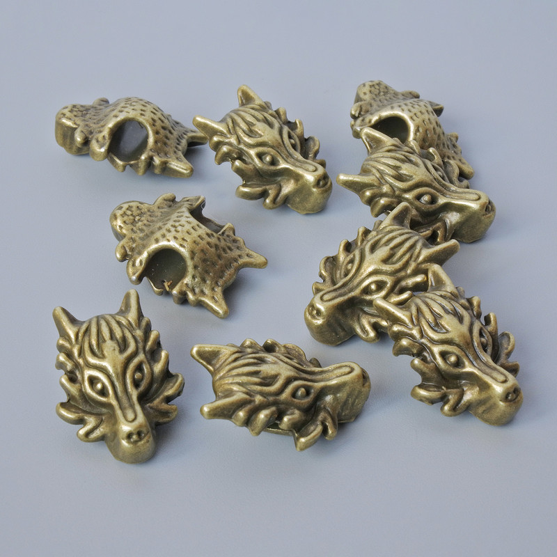 Bead insert 'Dragon', 18x13x8 mm, hole diameter 3.7 mm, pack of 9 pcs ±, bronze metal color
