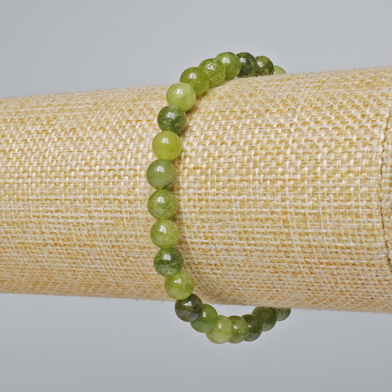 Jadeite bracelet with smooth beads, 6 mm diameter, 18 cm length (stretch)