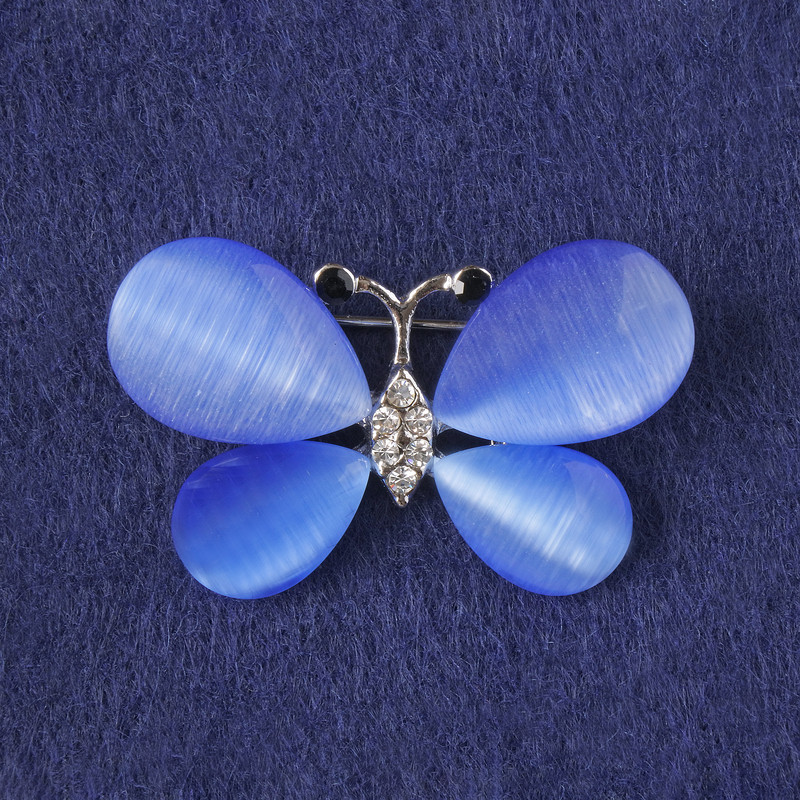 Brooch Butterfly blue cat's eye, white crystals, silver-toned metal 25x38mm+