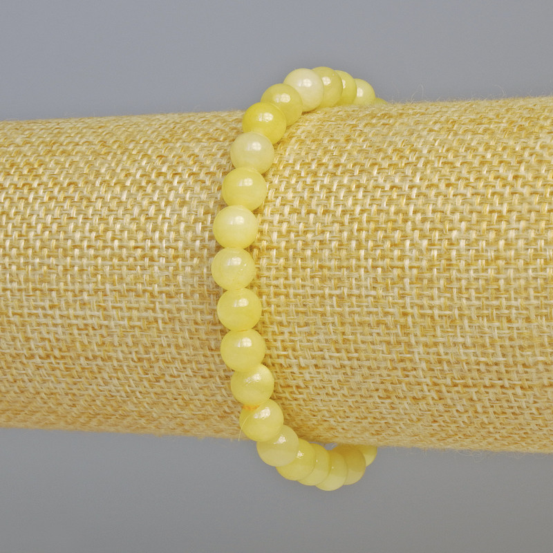 Bracelet with Citrine (artificial acrylic) smooth beads, 6mm diameter ±, stretch, length 18 cm