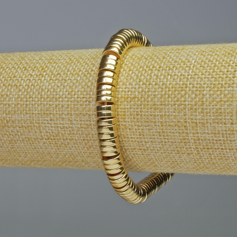 Stretch bracelet with hematite rondelle inserts, gold color, diameter 8x2 mm, length 18 cm