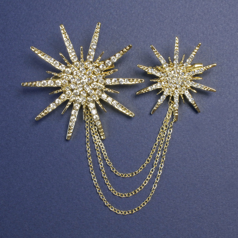 Double-Star Brooch with Chain, 55 mm and 38 mm diameters, and rhinestones