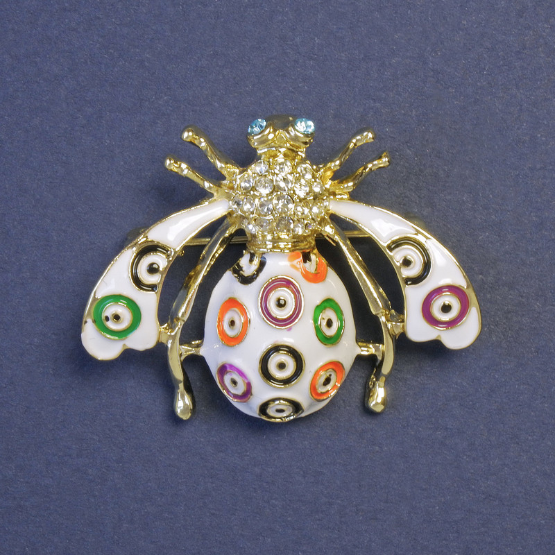 Insect Brooch with White Crystals, White, Green, and Orange Enamel on Golden Metal 39×30 mm+