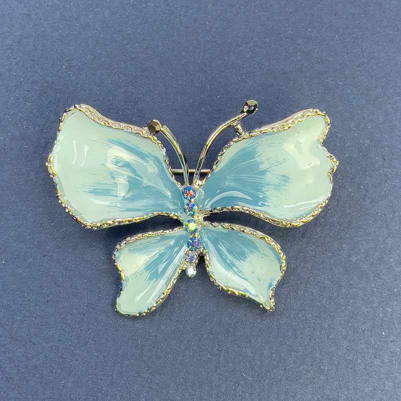 Brooch 'Butterfly' with crystals, blue enamel, silver-tone metal, diameter 44mm ±, length 33mm ±