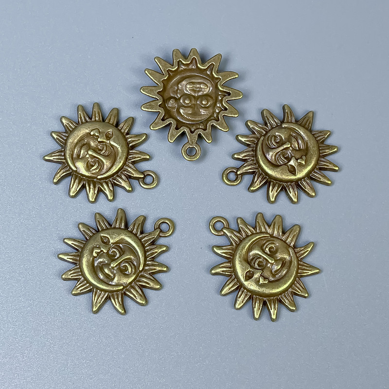 Pendant hardware Sun and Moon bronze color, size 20x23x3 mm +/- hole diameter 1.5 mm +/- packaging 10 pcs