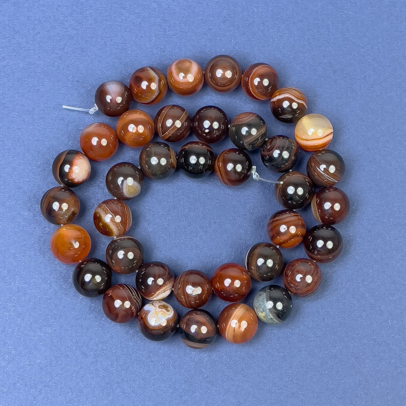 Eye agate beads on fishing line, smooth round beads, 10 mm diameter ±, length 38 cm ±