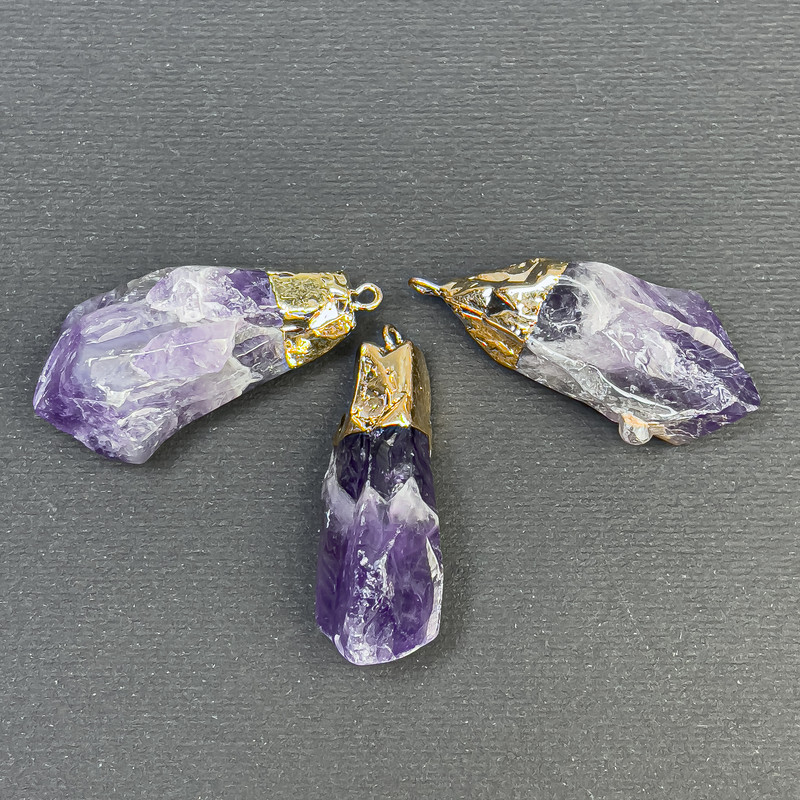 Raw Amethyst Pendant 37×15 mm ± Gold-Toned Metal