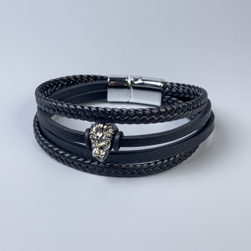 Men's bracelet in black eco-leather with metal inlays, thickness 12-20 mm, length 22 cm, silver-colored metal on the clasp