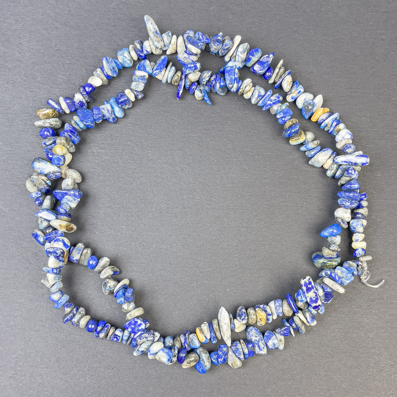 Lapis lazuli beads 7–11×3 mm on beading wire, length 80 cm+